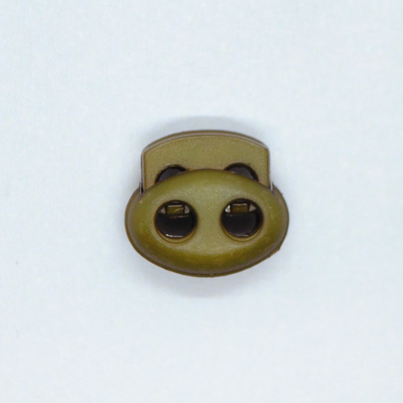 SNÖRSTOPP DUBBEL OLIV 4 mm Hål - 1849-0036